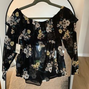 Tags still on, off the sleeve floral top, sheer.